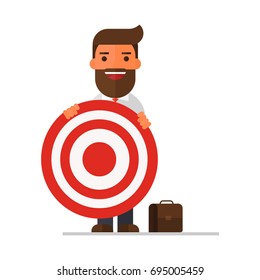 Business man holding big aim target