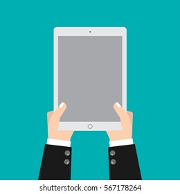 Business man holding digital tablet.