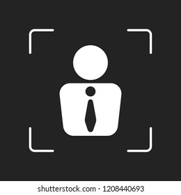 business man icon. White object in camera autofocus on dark background