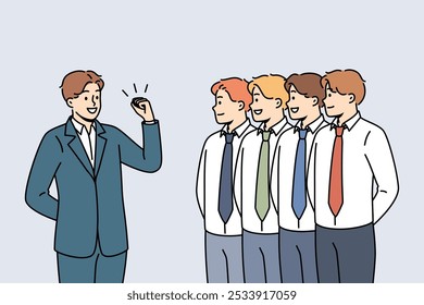 Business man leader gives motivational speech to team of office clerks standing in row. Manager with leadership qualities conducts motivational training for colleagues to increase productivity