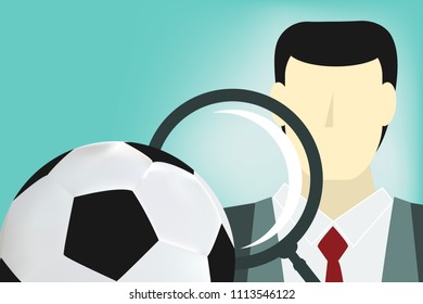 business man looks at soccer ball or football through the magnifying glass