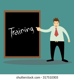 Business man pointing word on chalkboard; training concept