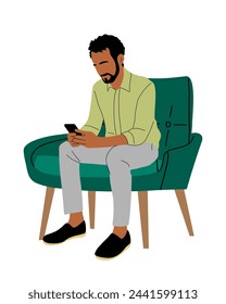 Business man sitting in armchair with laptop.