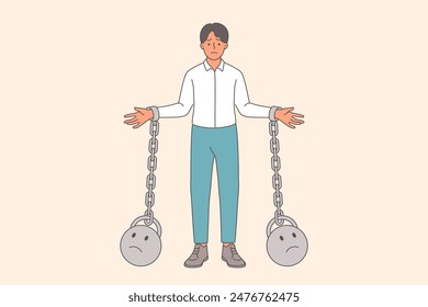 Business man slave suffers from lack of freedom and opportunity for self-realization, stands with weights tied in hands. Office slave experiences burnout becouse of absence choice and prospects