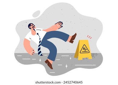 Business man slipped and fell on wet office floor due to clumsiness and unwillingness to look around. Guy fell after making mistake on way to workplace, for concept of corporate risk