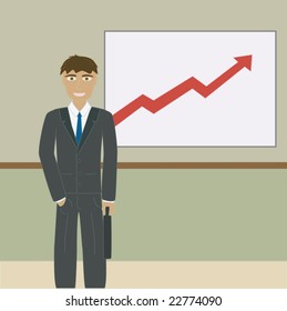 Business man standing in front of chart.