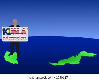 empresario parado en el mapa de Malasia con el cartel de Kuala Lumpur