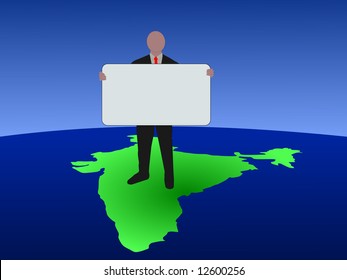 business man standing on map of India with blank sign