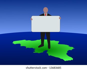 business man standing on map of Belgium with blank sign