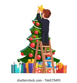 Business man standing on a stepladder putting traditional gold star topper on top of decorated Christmas fir tree. Businessman decorating New Year pine with star. Flat isolated vector illustration.