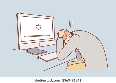 Business man suffers from computer breakdown and grabs head seeing progress bar on monitor. Concept bad internet connection negatively affecting business processes and causing stress to employees