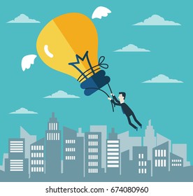 Business man try to catch flying idea