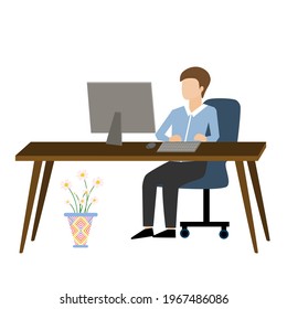A business man is working with computer on the table in the office