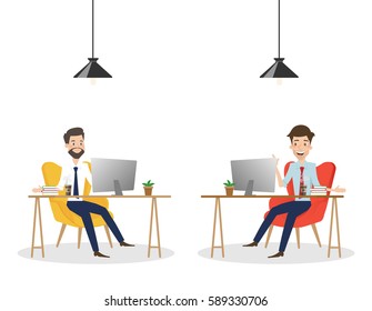 Business man working on computer at office desk.