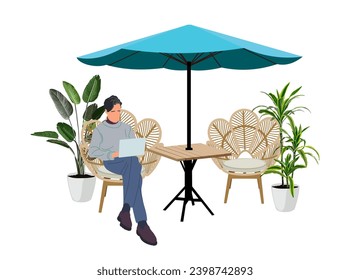 Business man working on laptop in street cafe.