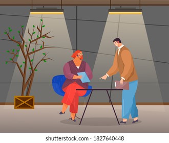 Business meeting colleagues or partners. Businesswoman sitting at desk with clip board in office interior engaged in project management. Male character talking to lady boss, explains something to her