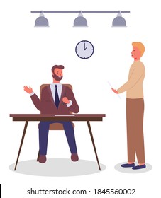 Business meeting, signing an agreement. Businessman chief sitting at a table listening to employee holding paper document in hand. Man manager talking to boss about conclusion of a new contract