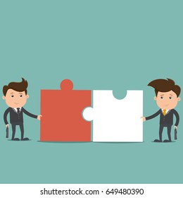 Business men assembling pieces of a puzzle , Concept of teamwork