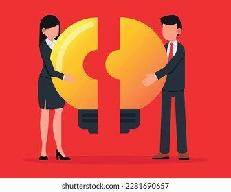 Business metaphor of a joint venture, partnership or teamwork. business man and woman putting together light bulb shaped puzzle.