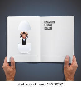 Business monkey with egg printed on book. Vector design
