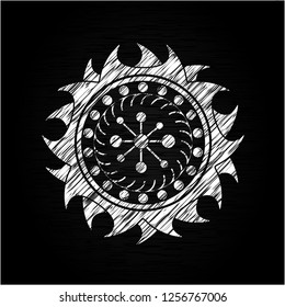 business network icon inside chalkboard emblem on black board