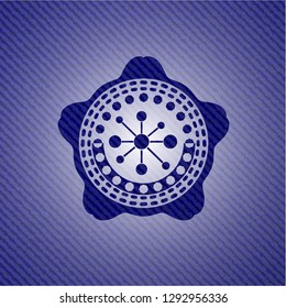 business network icon inside emblem with denim texture