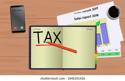 Business notebook (diary) with text Tax. With free blank space for your text. On business desk with reports, mobile and coffee