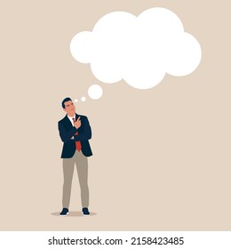 Business and office concept - handsome businessman looking up at text bubble.