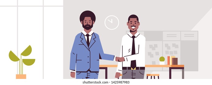 business partners man woman handshaking african american couple hand shake during meeting agreement partnership concept modern co-working center office interior flat portrait horizontal