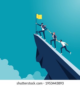 Business people climb to the top of the mountain, leader helps the team to climb the cliff 