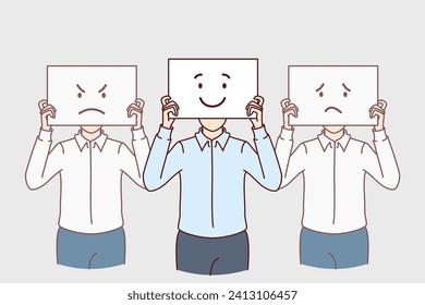 Business people with different emotions depicted on posters hiding faces symbolize lack of unanimous opinion among team. Men in office clothes and showing banners with bad or good emotions