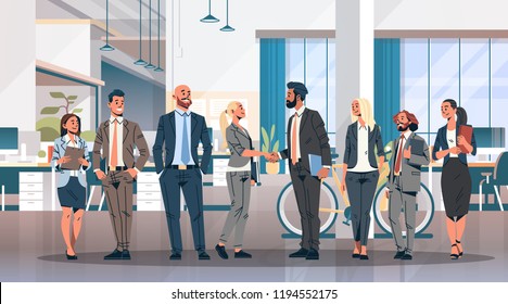 business people group hand shake agreement communicating concept modern coworking office interior creative workplace men women partnership male female cartoon character full length horizontal flat