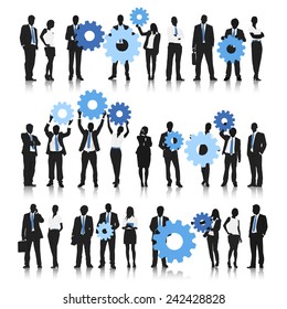 Business people holding gear bubble.