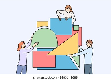 Business people put together puzzle in attempt to build reliable company that brings good profits. Students solve puzzle demonstrating teamwork and synergy increasing chances of success