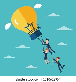 Business people try to catch flying idea