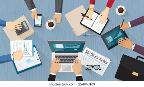 Business people working a on a desk top view with computer, tablet and stationery