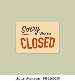 A business sign that says "Sorry, We're Closed".