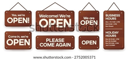 Business signboard set with open and working hours displayed on dark wood in a commercial setting for informing customers about availability.