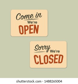 Business signs that say "Come In, We're Open" and "Sorry, we're Closed".