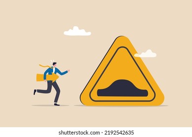 Business slow down due to obstacles, difficulty or speed limit, beware of crisis ahead or recession, economic depression concept, businessman running with arrow to find speed bump slow down sign.