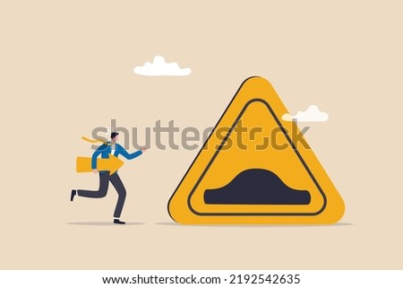 Business slow down due to obstacles, difficulty or speed limit, beware of crisis ahead or recession, economic depression concept, businessman running with arrow to find speed bump slow down sign.