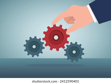 Business solution to fix problem, expertise and skill to drive success, leadership to connect business part strategy concept, businessman hand put important gear or cogwheel to make machine run good.