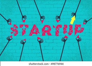 Business startup concept. Many hands working together to fill out the part of startup wording.