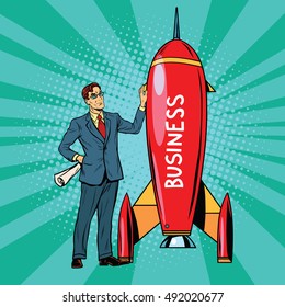 Business startup man near a space rocket, pop art retro vector illustration