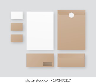 Business stationery mockup with envelopes, paper, business cards. Corporate identity template set. Mockup isolated on grey background. 