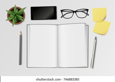 Business Still Life From Above With Creative Workplace With Open Blank Book, Pencils, Glasses, Smartphone, Notes And Plant In Pot