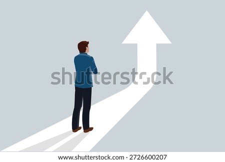 Business success to the next level concept. Businessman standing in front of arrow symbol illustration, challenge to become better and achieve success, vision to see next goal, motivation to succeed.	
