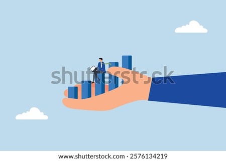 Business support, intelligent entrepreneur using computer on expansion chart in enormous hand. 