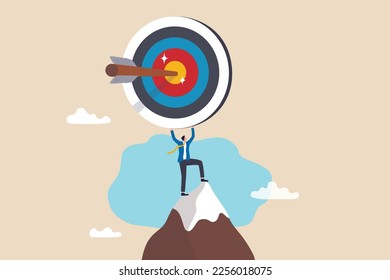 Business target, aiming high goal, objective or purpose, skill or aspiration to achieve target, precision or accuracy concept, success businessman holding big target with arrow hit bullseye center.