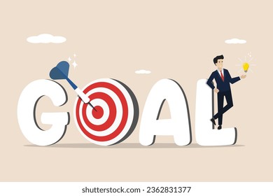 Business target, business success target, success or business success, right on target, successful businessman standing next to the writing GOAL target. Illustration of a successful businessman